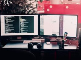 desktop with 2 screens and it shows someone learning How to Learn Web Development